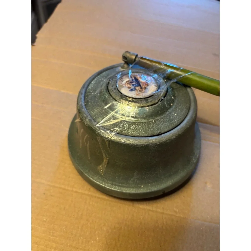 This vintage Victorian powder/music box is a rare and charming collectible piece